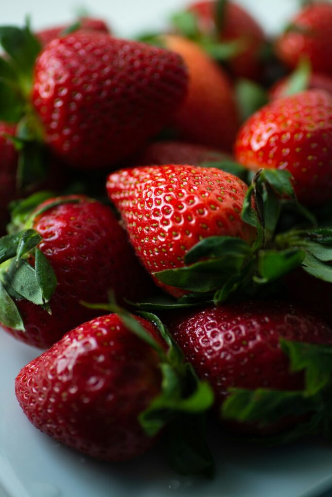 Maximize Your Berry Bounty: How Many Strawberry Plants Per Square Foot?